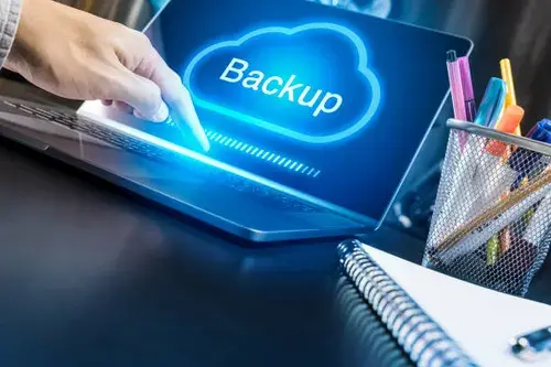 businessman-hand-using-modern-laptop-with-cloud-backup-concept.webp